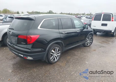 2018 Honda Pilot Touring z USA, uszkodzony, nr VIN 5FNYF5H99JB017044